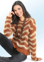 Trui met glittereffect en franjes aan de golvende zoom 