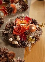 Natuurlijke theelichthouder met echte kegels 