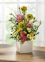 Arrangement in witte keramische pot 