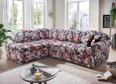 Gestoffeerde zithoek met slaapfunctie en bedlade 