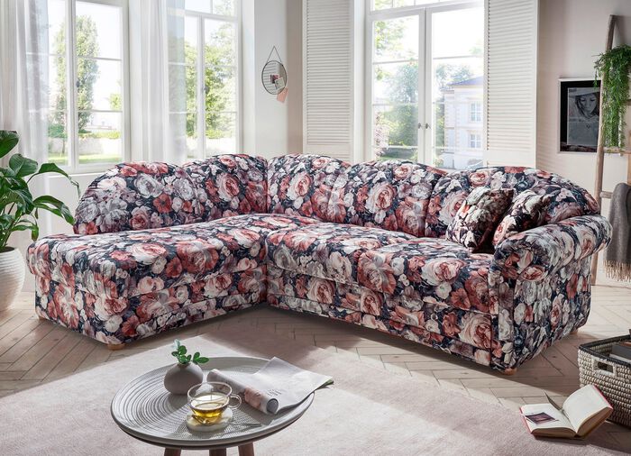 Gestoffeerde zithoek met slaapfunctie en bedlade 