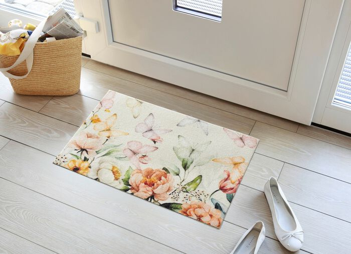 Aantrekkelijke deurmat met bloemen en vlinders 