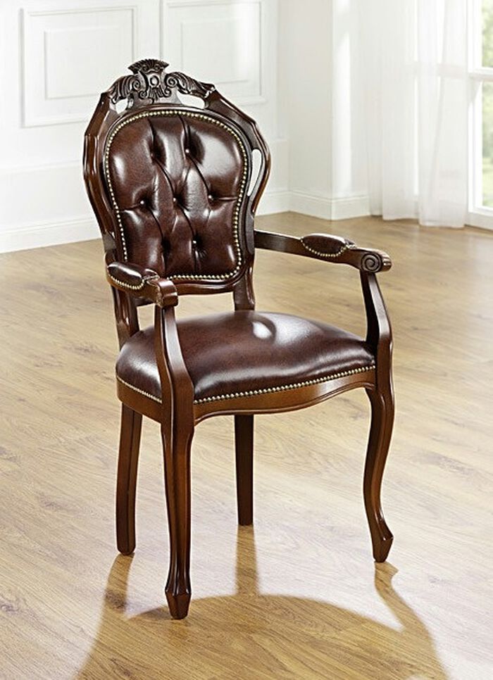 Eetkamerstoelen en fauteuils met leren bekleding 