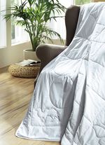 Knuffelig, temperatuurregulerend dekbed van kamelenhaar 