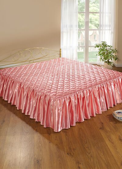 Elegante, glanzende sprei en kussenslopen met quilting in schelplook 