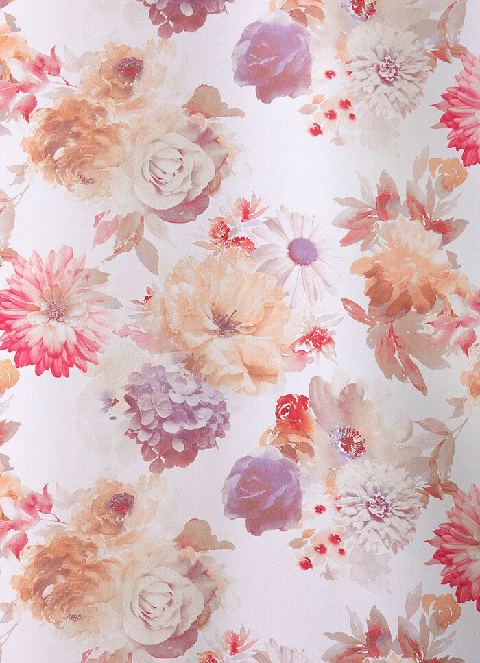 Bloemenmotief over gordijn 