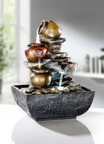 Verlichte kamerfontein 