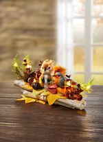 Verlicht tafelbloemstuk 