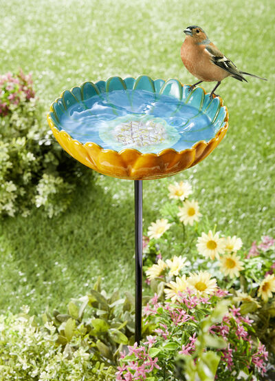 Vogelbadbloem van geglazuurd keramiek 