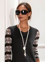 Sluitingsloze witte parelketting 