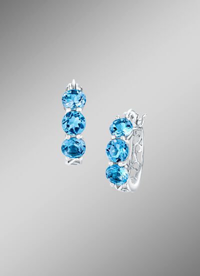 Versierde oorringen met blauwe topaas 