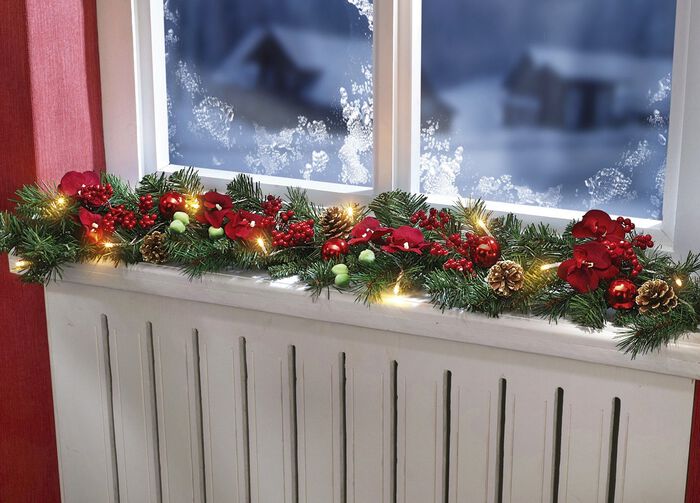 Verlichte guirlande met dennentakjes 