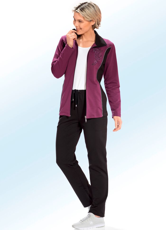 Vrijetijdspak met contrasterende inzetstukken en decoratieve biezen 