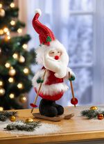 Kerstman op ski's 