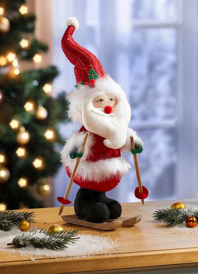 Kerstman op ski's 