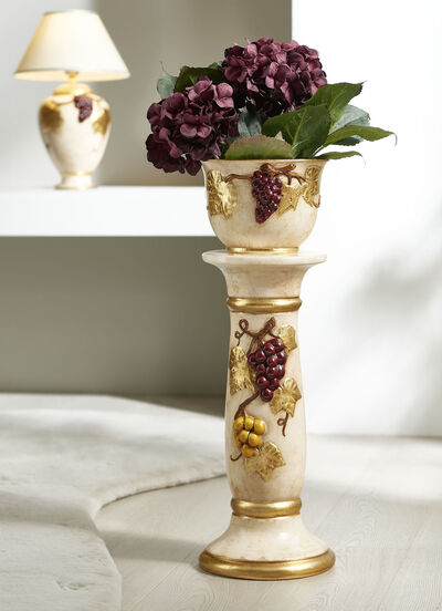 Kolom met plantenbak met bladgoud 