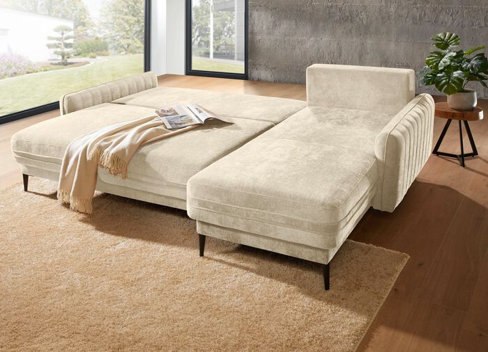 Gestoffeerde hoek met bedfunctie en bedkast 