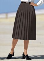 Rok met figuurstrelende plooien rondom 