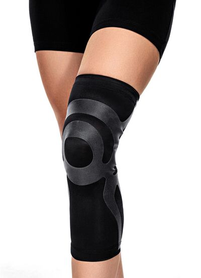 Kniebrace met ge&iuml;ntegreerde tapes 