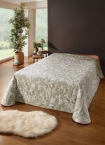Sprei en kussenslopen in natuurgrasdesign 