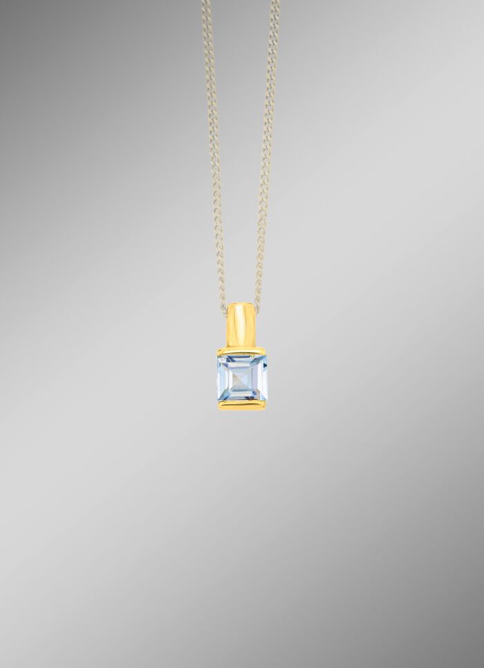 Unieke hanger met blauwe topaas 