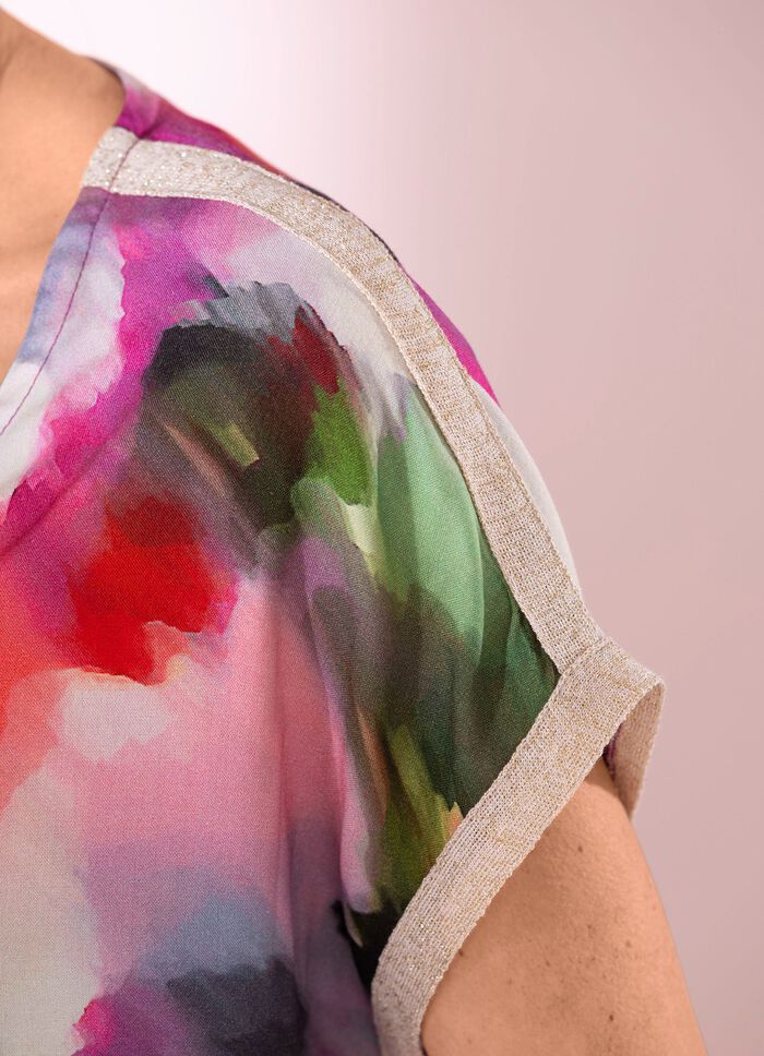 tuniek met glanzende linten 