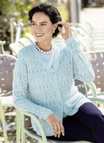 Gebreide twinset met opengewerkte accenten 