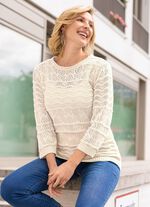 Trui met decoratief golvend patroon en mix van motieven 