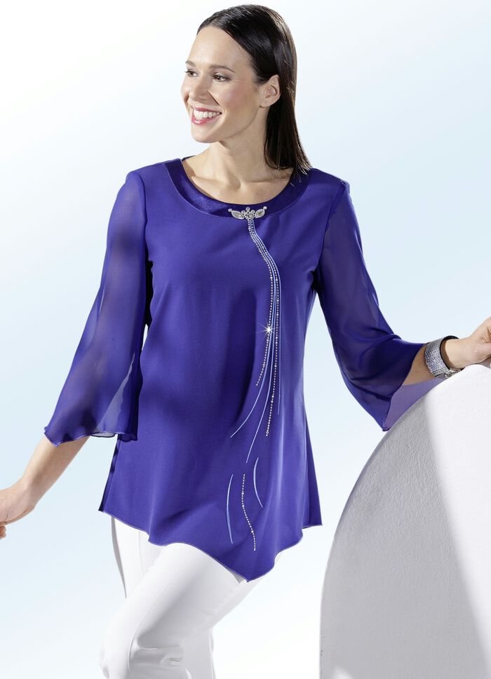 Tuniek met glanzende edelstenen 