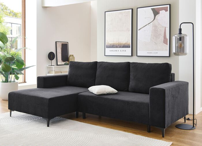 Gestoffeerde hoek met bedfunctie en bedkast 