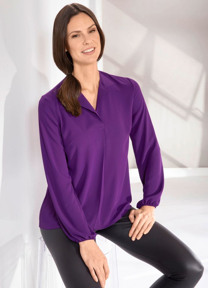 Tuniek met stolpplooien 