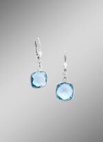 Mooie oorbellen met beh. blauwe topaas 