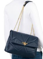 Laurina tas met knevelsluiting in extravagante libellevorm DONKERBLAUW