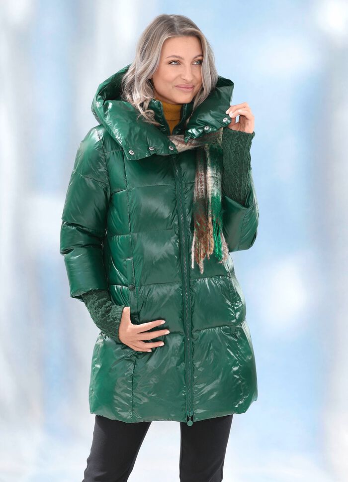 Jas met een lange gebreide manchet bij de manchetten 