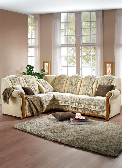 Gestoffeerde zithoek met slaapfunctie en bedlade 