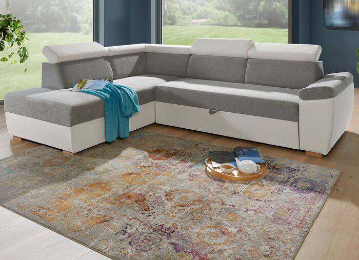 Gestoffeerde hoek met bedfunctie en verstelbare hoofdsteunen 