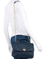 Laurina tas met knevelsluiting in extravagante libellevorm DONKERBLAUW