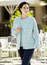 Gebreide twinset met opengewerkte accenten 