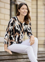 Fijngebreide trui met dierenprint 