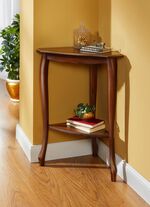 Hoekbijzettafel met goudkleurige decoraties 