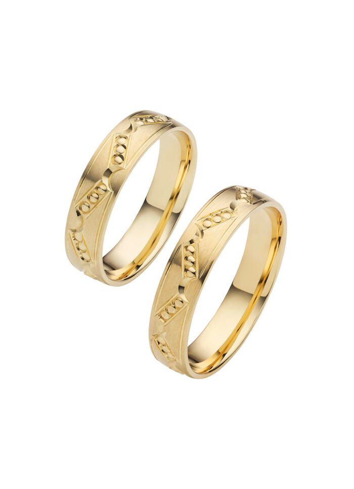 Gematteerde trouwring met stippenpatroon 