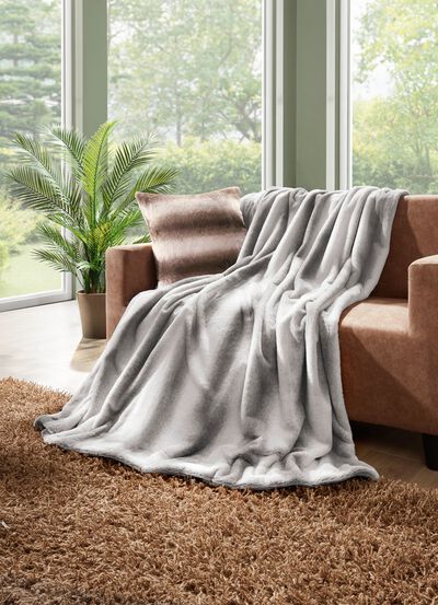 Deken en kussensloop van imitatie konijnenbont 