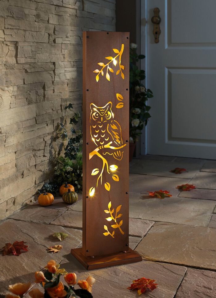 Decoratieve stele-uil met LED's van ijzer in roestlook 