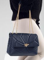 Laurina tas met knevelsluiting in extravagante libellevorm DONKERBLAUW