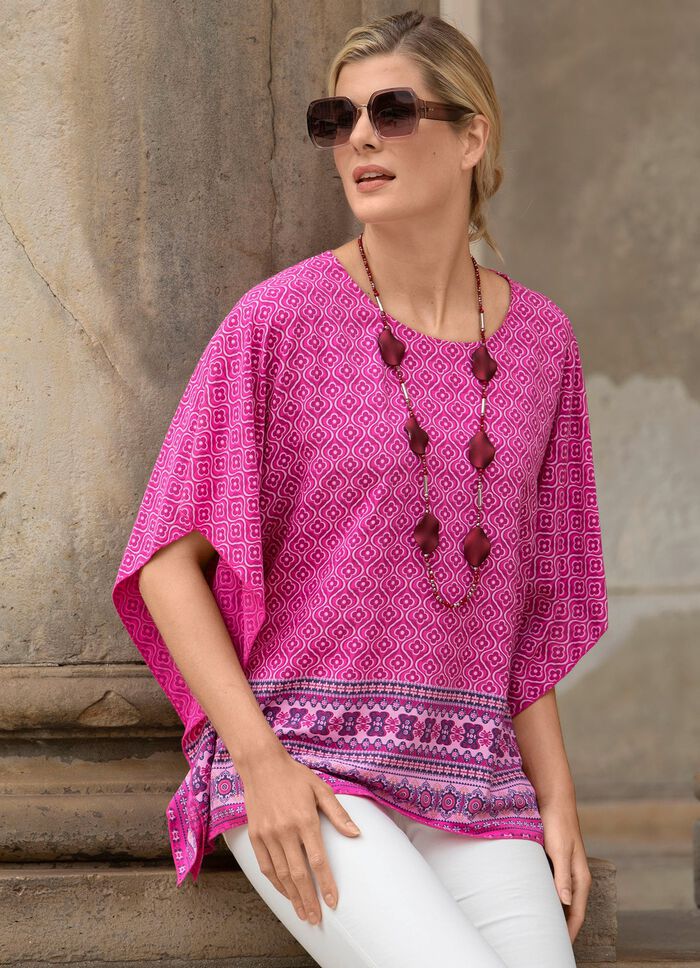 Ponchotuniek met kapmouwen 