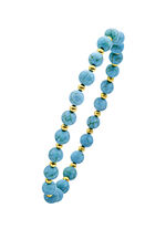 Armband met turquoise bolletjes
