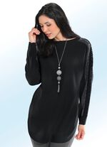 Trui met kanten rand en strassversiering 