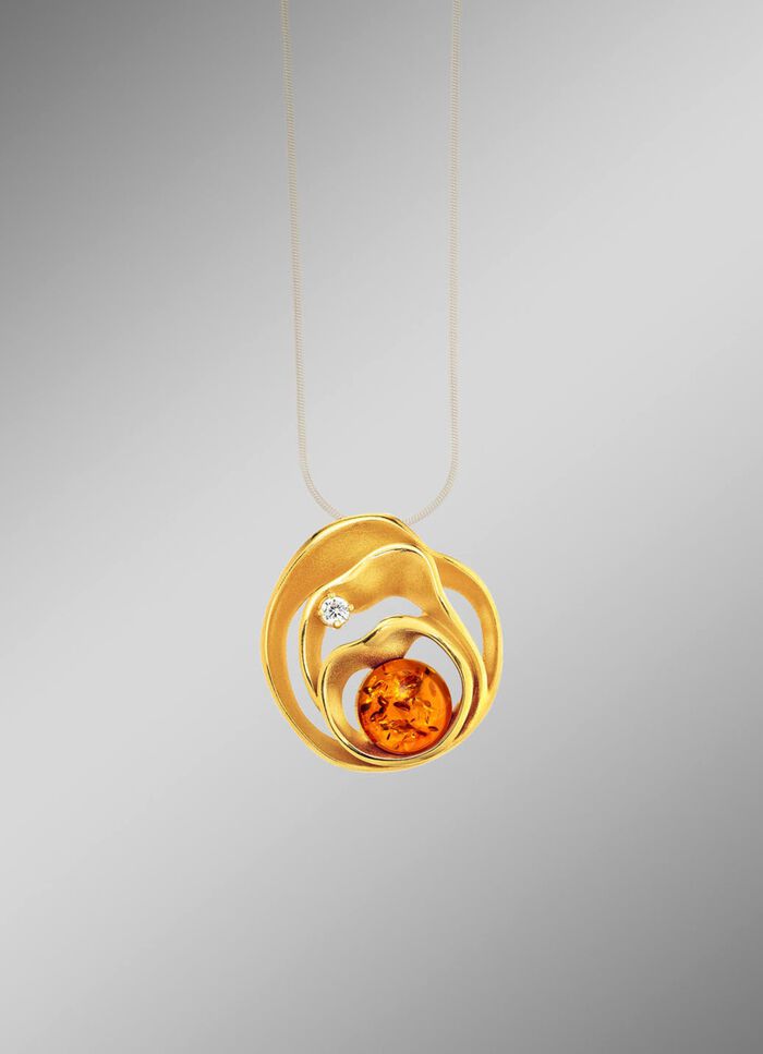 Spannende hanger met barnsteen en synthetische zirkonia 