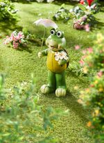 Schildpad met zonnebloem en paraplu 