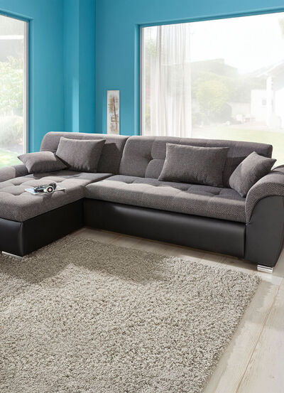 Gestoffeerde zithoek met slaapfunctie 